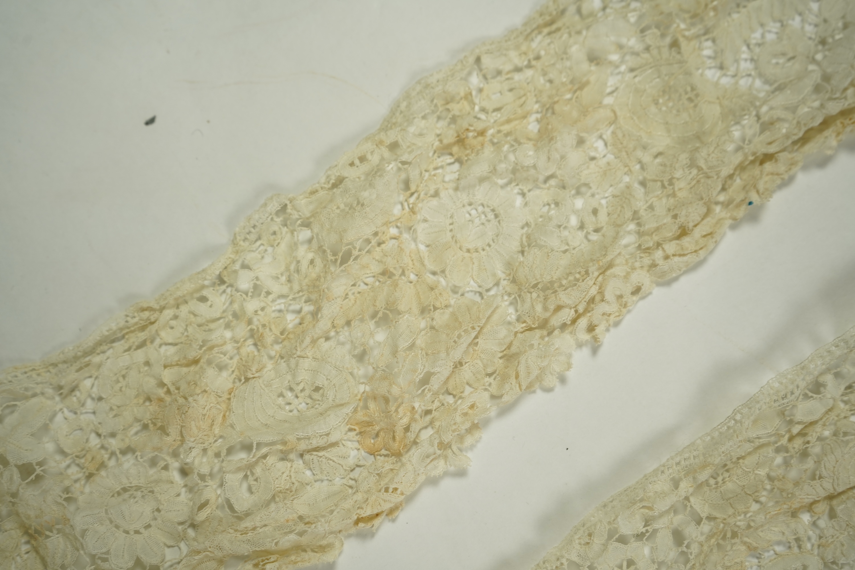 A mixed Brussels bobbin lace and Point de Gaze lace collar, another smaller collar, a similar length of trim and butterfly motif, together with a Brussels bobbin collar and trim, an Irish crochet cuffs, a Valenciennes la
